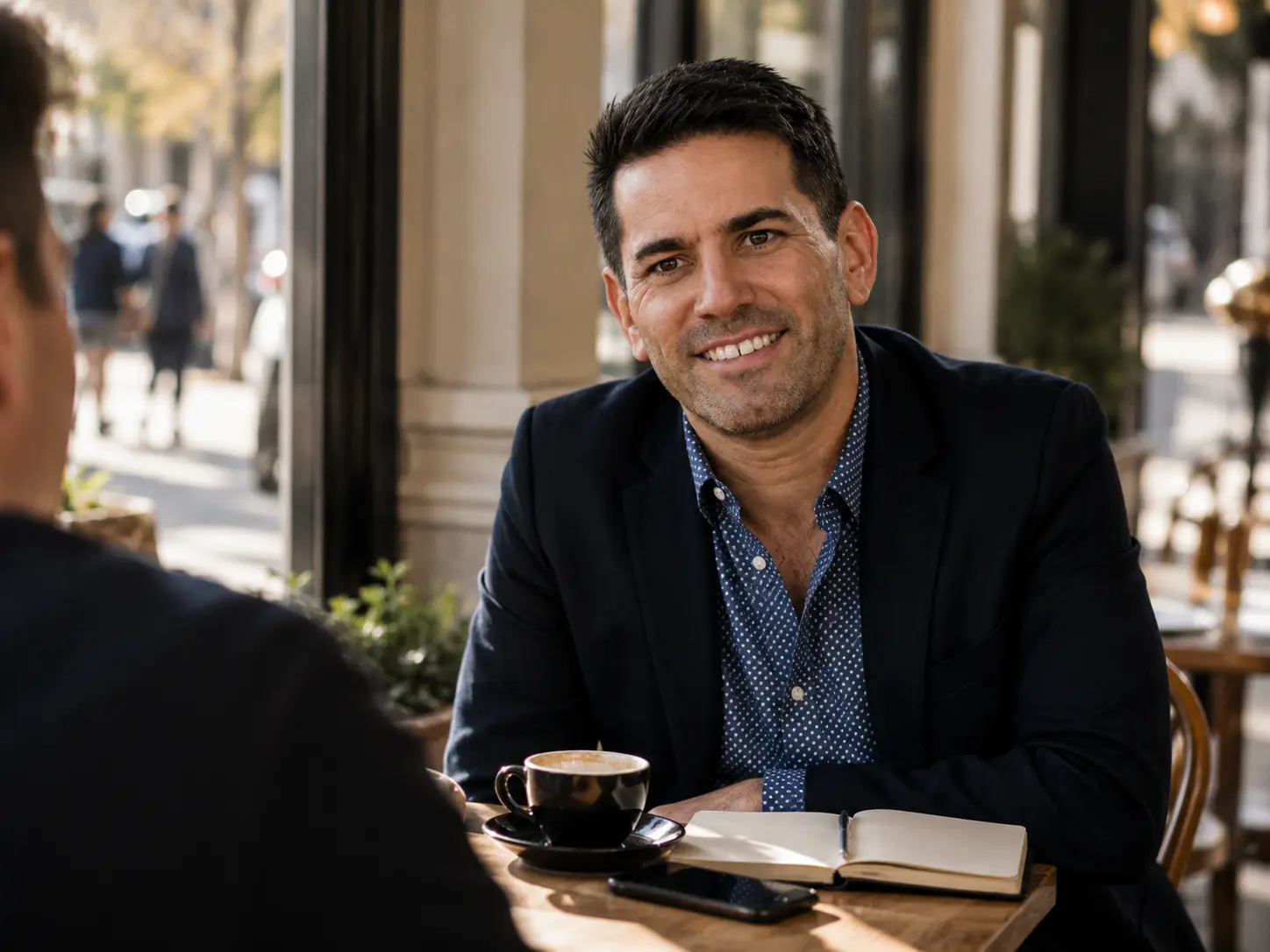 Marty Tucker working closely with a client over coffee, Zib Digital Partner